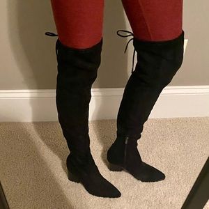 Never yet worn over-the-knee boot.